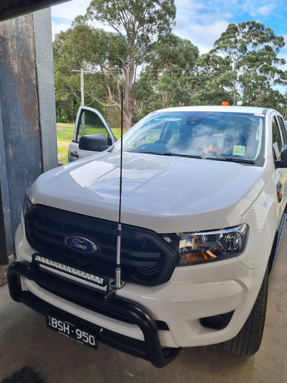 Four-wheel drive with roof lights and a UHF antenna fitted